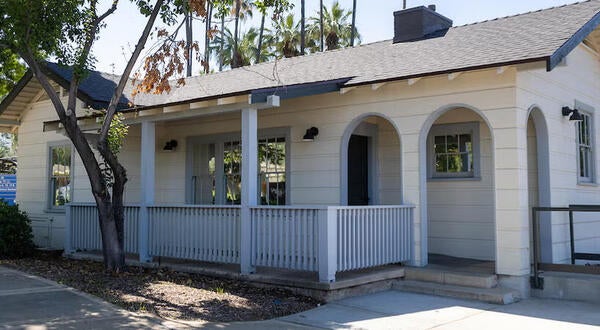 Exterior of a beige cottage