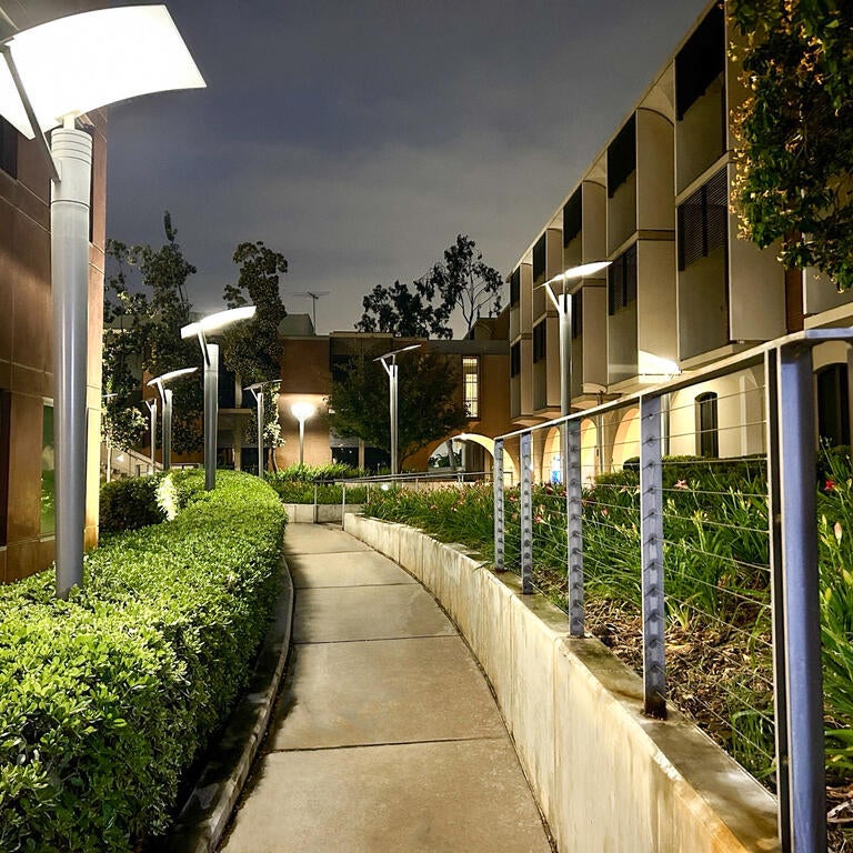 Exterior lighting of walkway between buildings