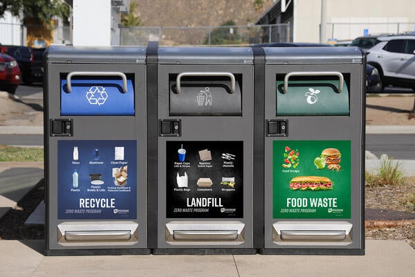 Three solar powered waste bins