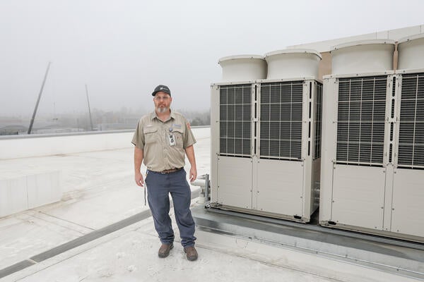 Mechanic on a rooftop