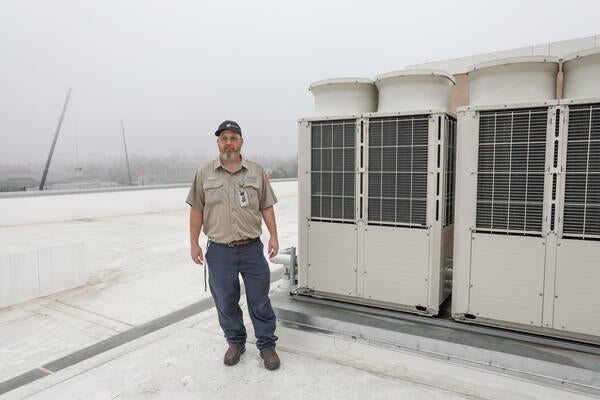 Mechanic on a rooftop