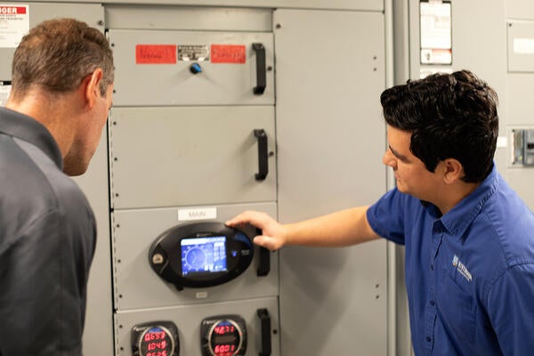 Hondo working on a smart meter