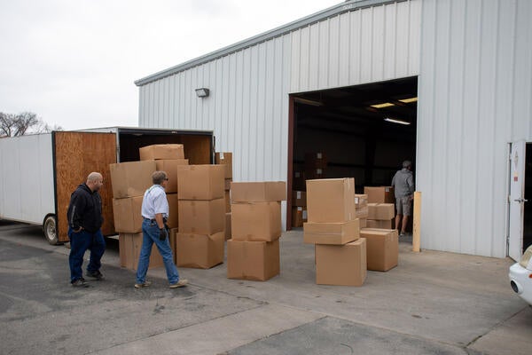 Boxes are delivered outside a warehouse