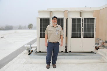 Mechanic on a rooftop